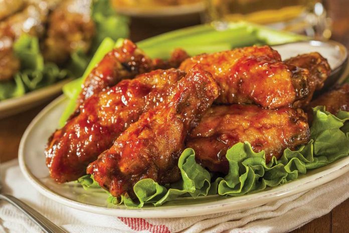 Maple Bourbon Chicken Wings A plate of Maple Bourbon Chicken Wings