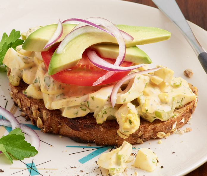 Egg Avocado Toast Toast layered with Egg Salad, Tomato and Avocado