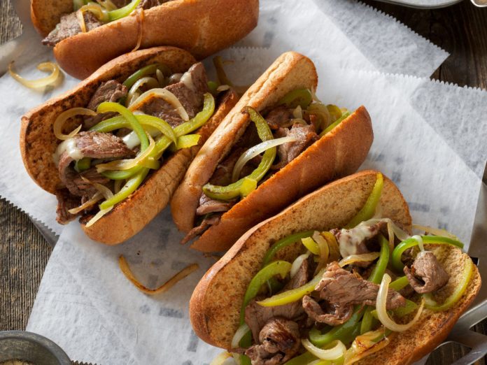 Philly Cheese Steaks Philly Cheese Steaks on a tray