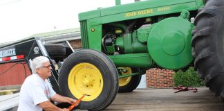 FTC sues Deere for blocking farmers’ right to repair Deere R wheel