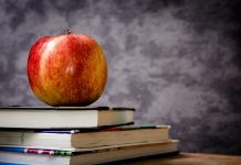 Reader: Public school system failing to impart knowledge apple on a desk