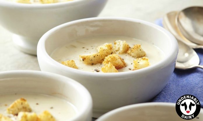 Caraway Cheese Soup Bowls of Caraway Cheese Soup with croutons on top.