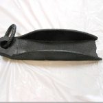 Can you identify this cast iron antique item?