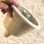 Can you name this antique pottery item?