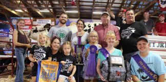 Morgan Campbell sold the grand champion dairy cheese for $6,000 to Paris and Washington Insurance, and Wallace Farms Feed & Drive-Thru.