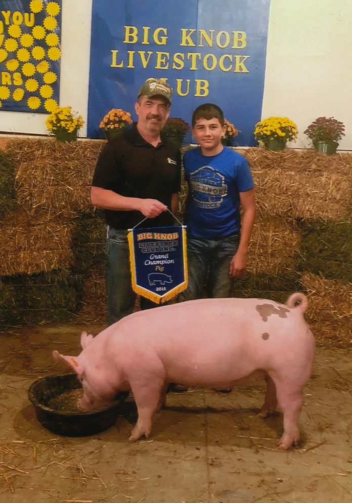 20 18 Big Knob Grange Fair grand champion hog Josh Yeck and his 266-pound grand champion hog