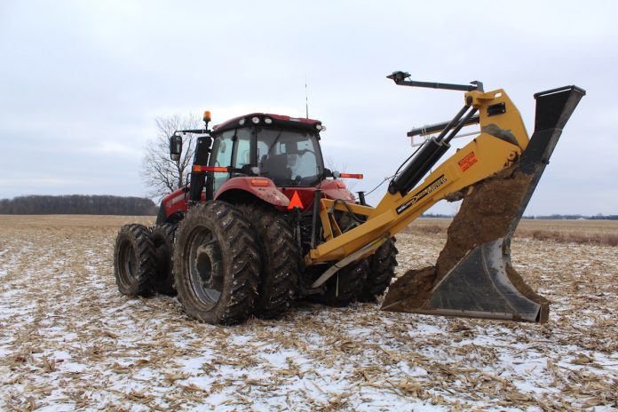 Davis tiling machine 1 Installing tile