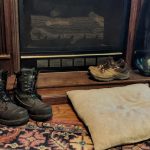 Tidy up boots by a doorway