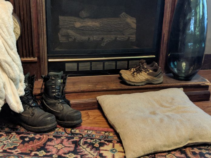 boots by a doorway