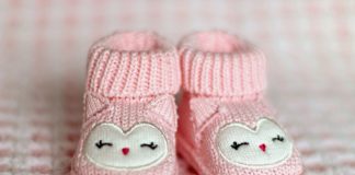 Gift of life made visible with recent birth of granddaughter pink baby booties