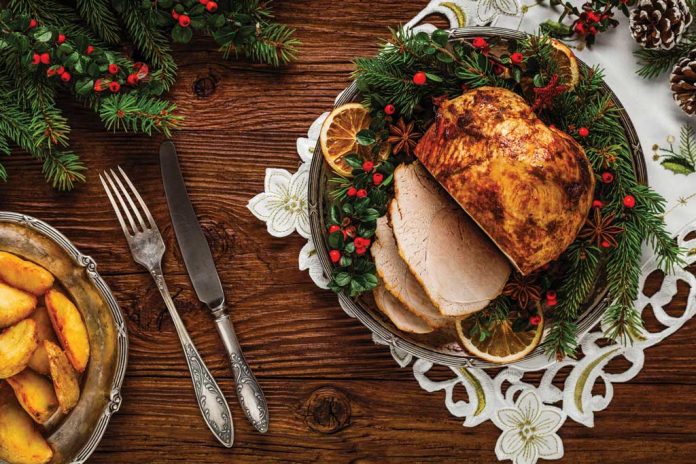 Herbed Turkey Breast Herbed Turkey Breast on a serving platter with decorations