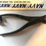 Do you know what this Hazard mystery tool is? Metal plyer like item with a c-shaped piece on the end of one of the arms and curved pinchers that do not sit flat together.