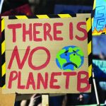 Earth Day concerns Protestors holding climate change banners at a protest
