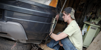 Lean on family and faith “when the wheels come off” BoyWonder repairing his vehicle