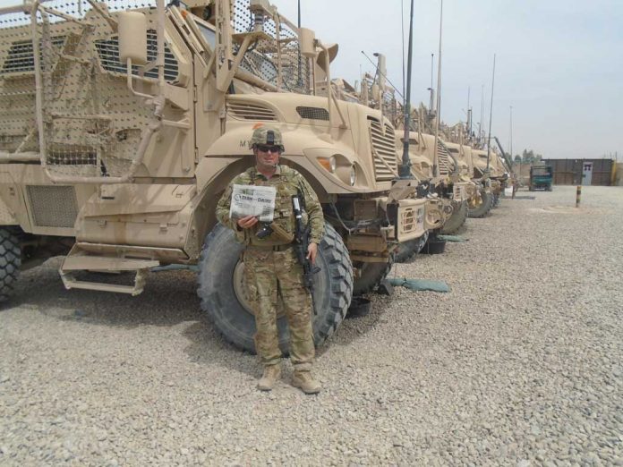 Maj. Mark Stepuk in Afghanistan with his Farm and Dairy newspaper Maj. Mark Stepuk in Afghanistan with his Farm and Dairy newspaper