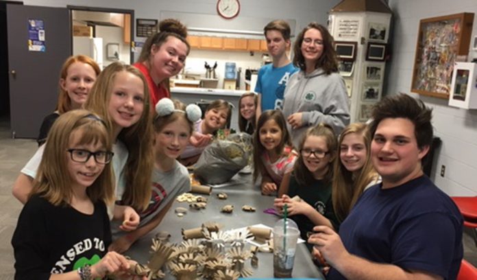 Rangers 4-H Members making toys for rescued rabbits. Rangers 4-H Members making toys for rescued rabbits.