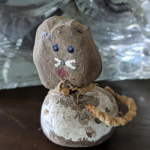 The family archives Kym Seabolt's cat craft made out of rocks