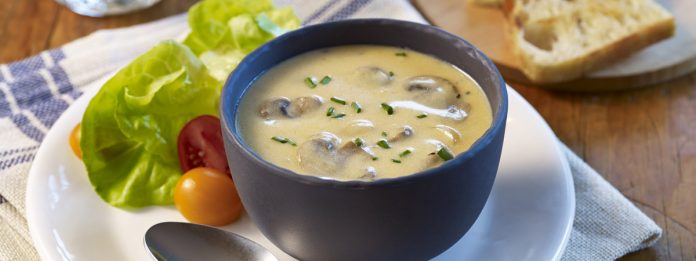 ATT-Mushroom Cheddar Soup A bowl of Mushroom Cheddar Soup
