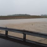 Flooding washes away Shelby County corn fields Flood waters in a shelby county corn field