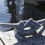 Tappan Marina project approved boat tied off to a dock