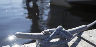 boat tied off to a dock