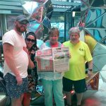 Cruising with the Keenes Janet Keene (holding Farm and Dairy), Lyle Printing commercial printing sales manager, and her husband Randy, of Salem, Ohio, cruised with Janet’s daughter and son-in-law, Chris and Tema Jordan, on the Symphony of the Seas recently. The boat is the largest cruise ship in the world.