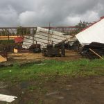 Managing hay fields and pastures when storms blow debris into them tornado damage to barn