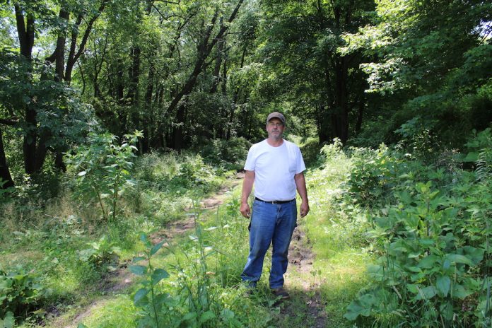 Mike cameron eminent domain farmer on railroad bed