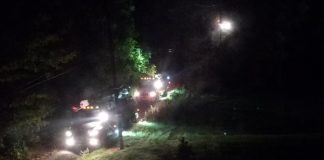 bucket trucks coming up Kym Seabolt's driveway