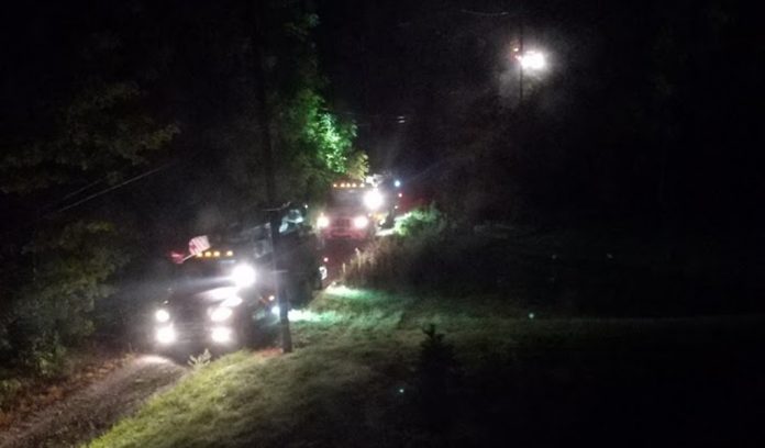 bucket trucks coming up Kym Seabolt's driveway bucket trucks coming up Kym Seabolt's driveway