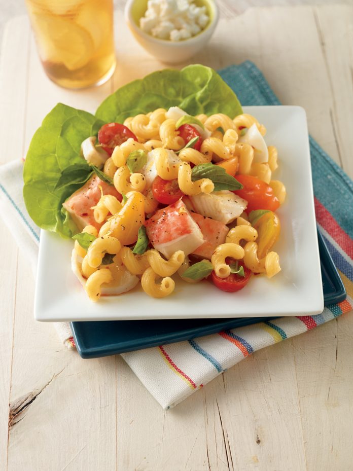 A dish of Seafood and Cherry Tomato Pasta .