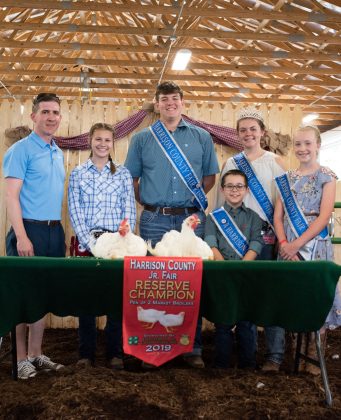 Adrianna Blazeski’s reserve champion market chickens sold for $275 to Owen and Porsche Beetham.