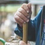 farmers hands on tool