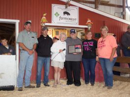 ‘A very blessed man’: Furlong wraps up lifetime of hog judging at Guernsey Co. Fair Darell Furlong stands with Ginny Barker and members of the hog committee after they recognized him with a plaque for his retirement.