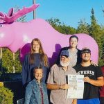 Ice cream at the Pink Moose with the Rhoades family! The Rhoades family pose in front of the Pink Moose statue on Mackinaw Island