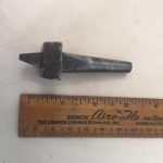 Can you name this spike-like antique tool?