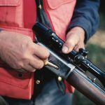 Apply for controlled hunting opportunities hunter loading rifle orange vest