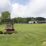 Rural businesses, professionals face limited broadband access A sign for M&M Feed Supply with the store behind it.