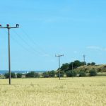 Support our farmers by expanding broadband now wheat-field with telephone wires