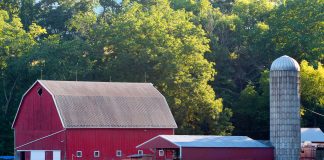 a red barn on a farm.