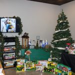 Young farmers raise $5,000 in agricultural toys for Christmas Agricultural toys under a Christmas tree.