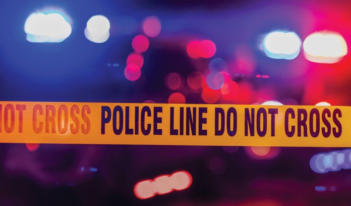 crime scene caution tape reading