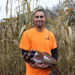Former Cleveland man finds passion in pheasants man with pheasant in arms