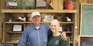 Farming driven by data, demand at Tierra Verde Farms couple standing behind counter
