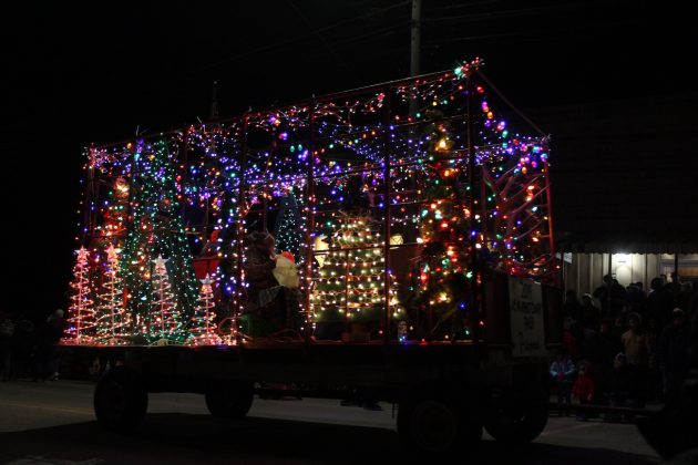 hay wagon turned into lighted tractor float