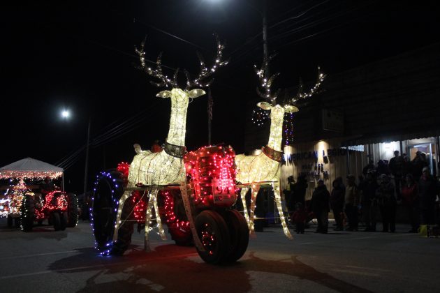 reindeer on lighted tractor