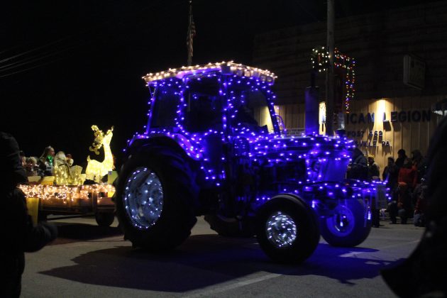 blue tractor in parade