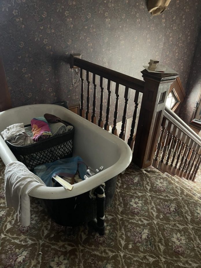 Kym Seabolt's bathtub in the hallway Kym Seabolt's bathtub in the hallway