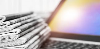 Ohio broadband grant program bill falls through A pile of newspapers on a laptop.