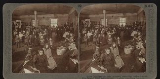 How to legally immigrate to the US immigrants waiting in Ellis Island for examination